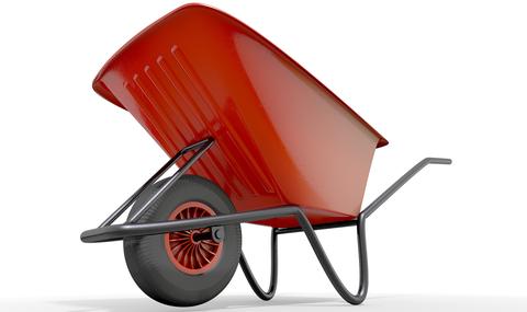 A typical red garden wheelbarrow on an isolated white studio background